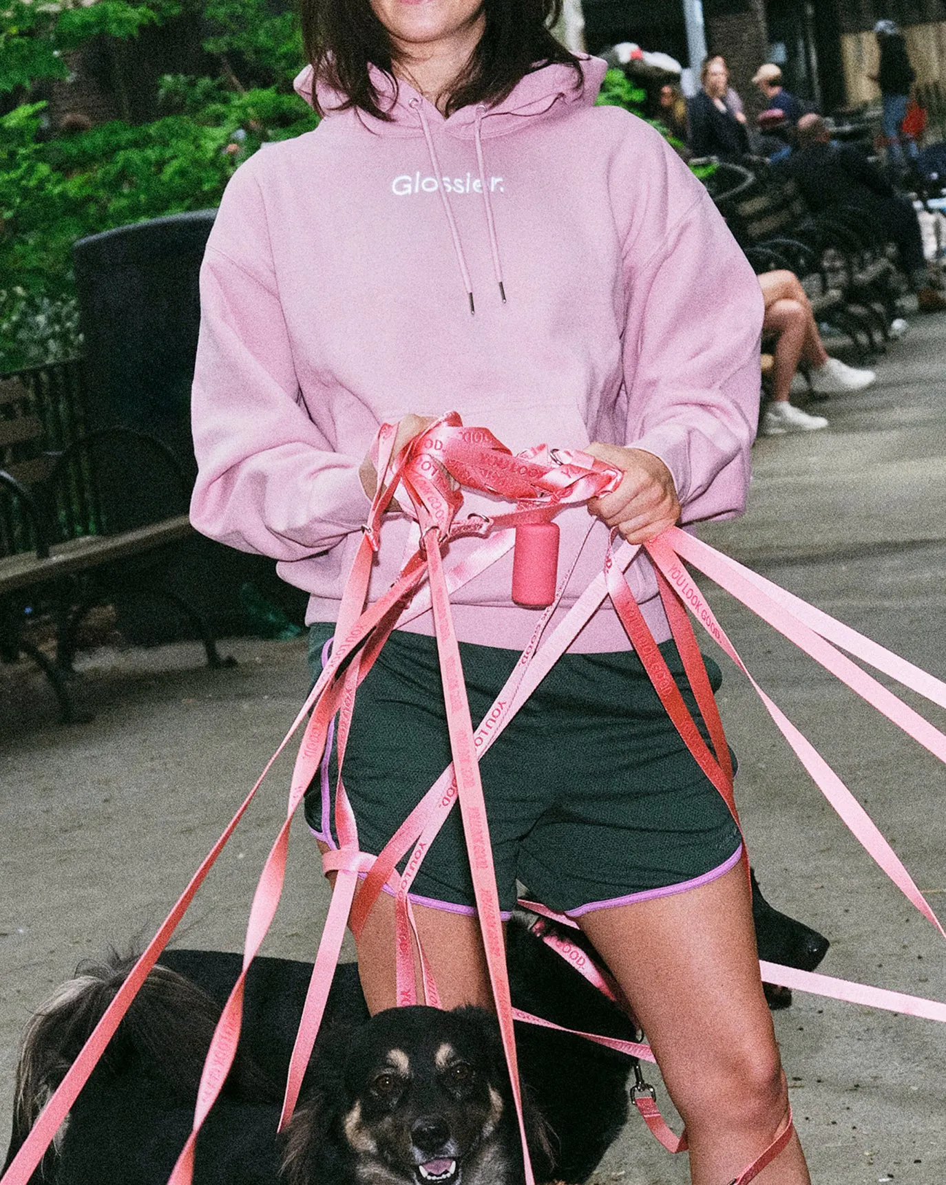 Georgia wears the Embroidered Pink Hoodie in size Large.