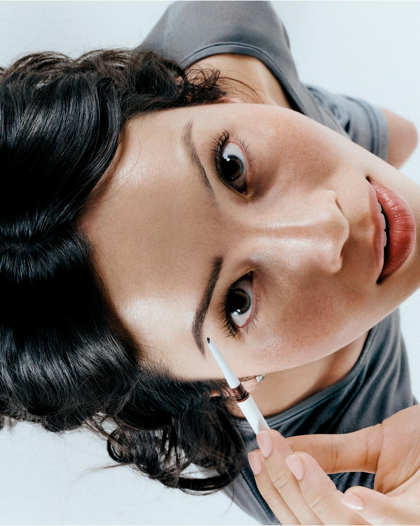 Chloe wears Boy Brow Arch in Warm Dark Brown