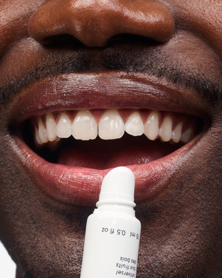 model wears balm dotcom in berry