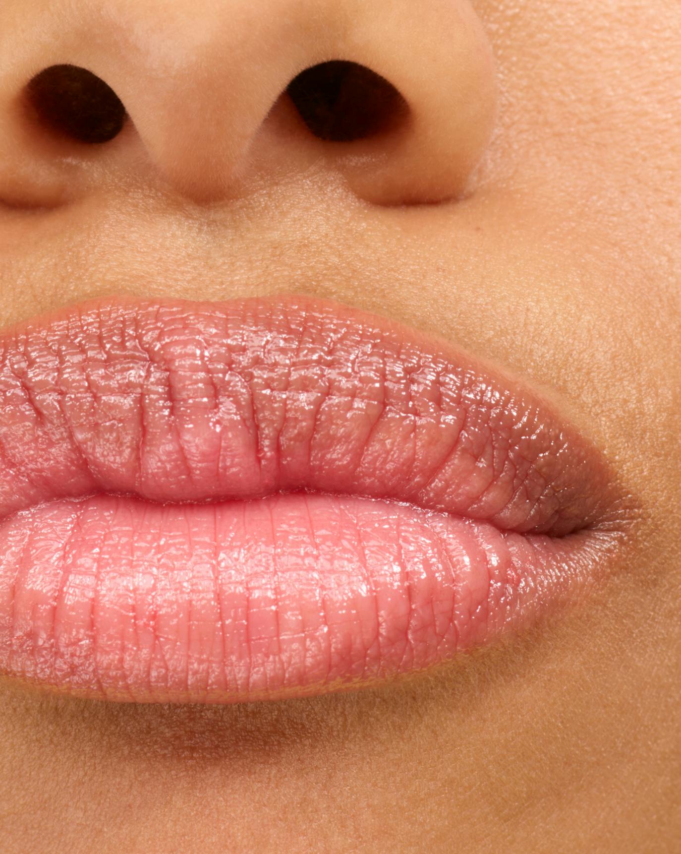 Sjournee wears Strawberry Balm Dotcom.