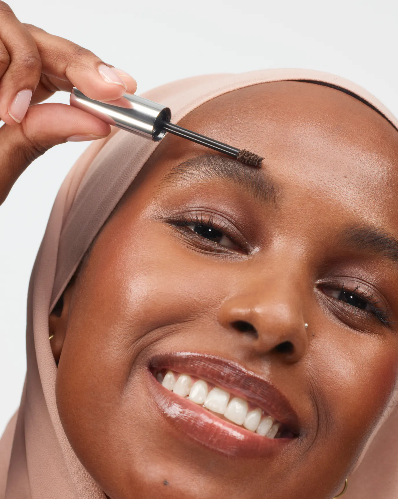 Nasra wears Boy Brow in Dark Brown
