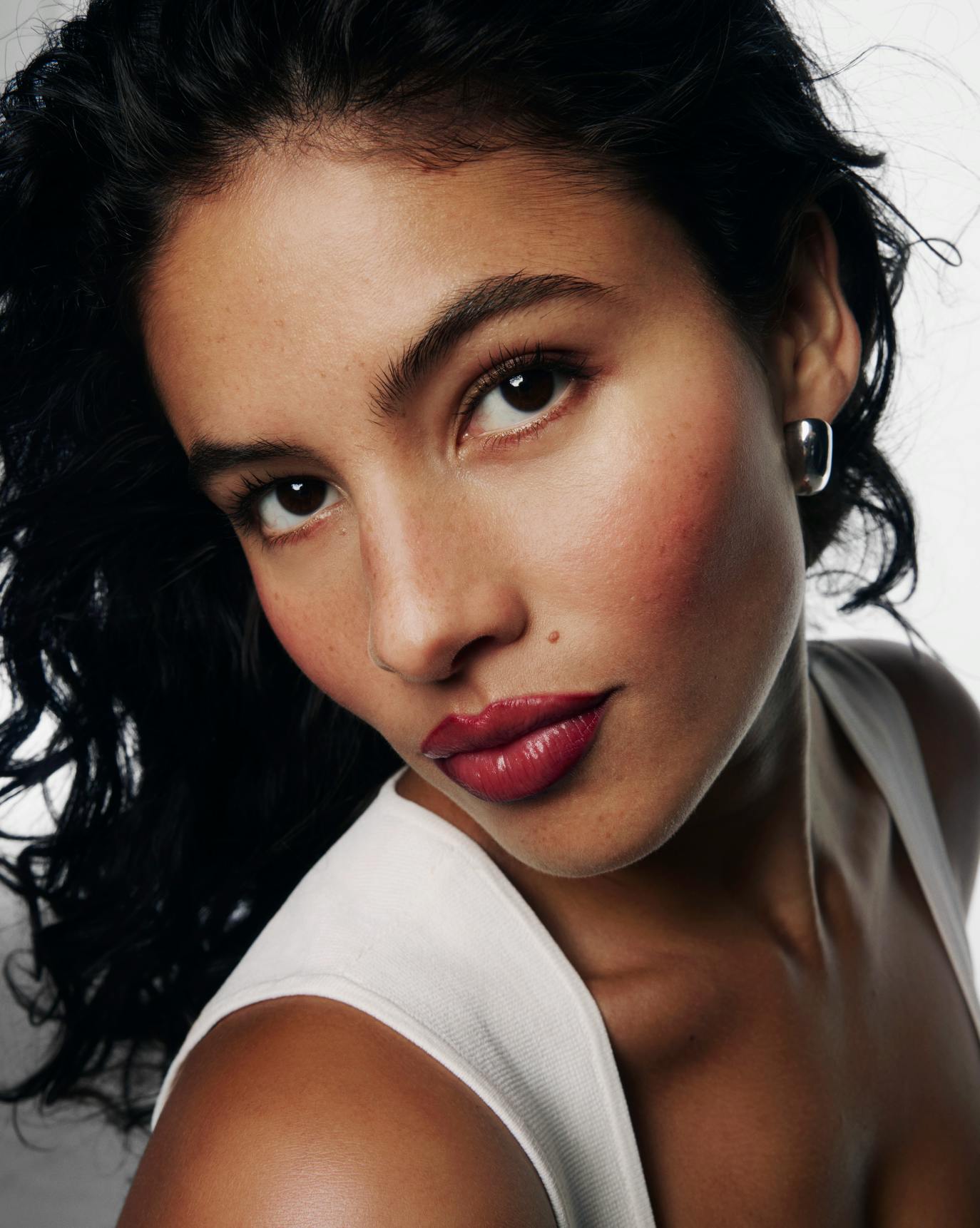 Isabella wears Cloud Paint in Black Cherry.