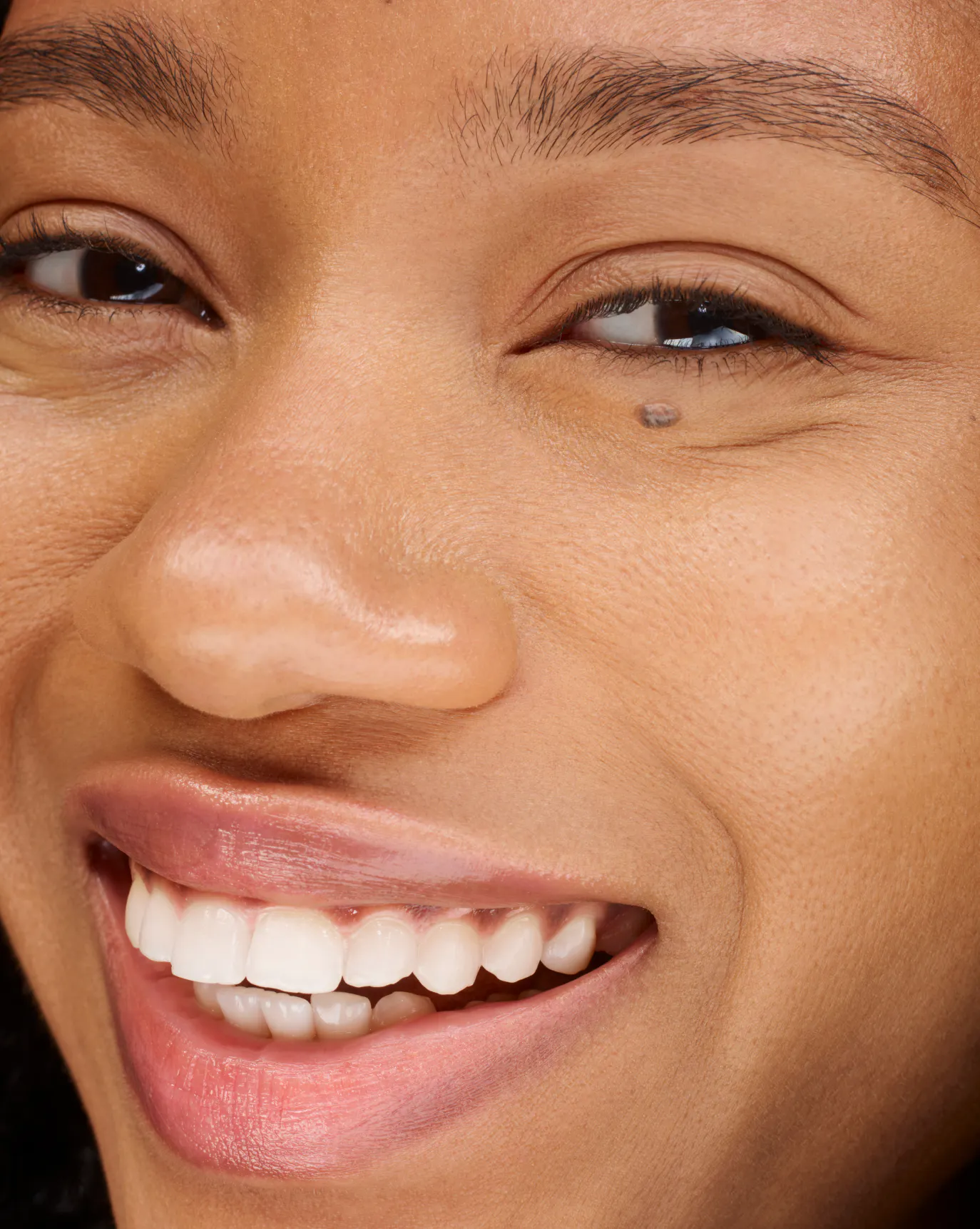 Naome in Stretch Balm Concealer, MT3.