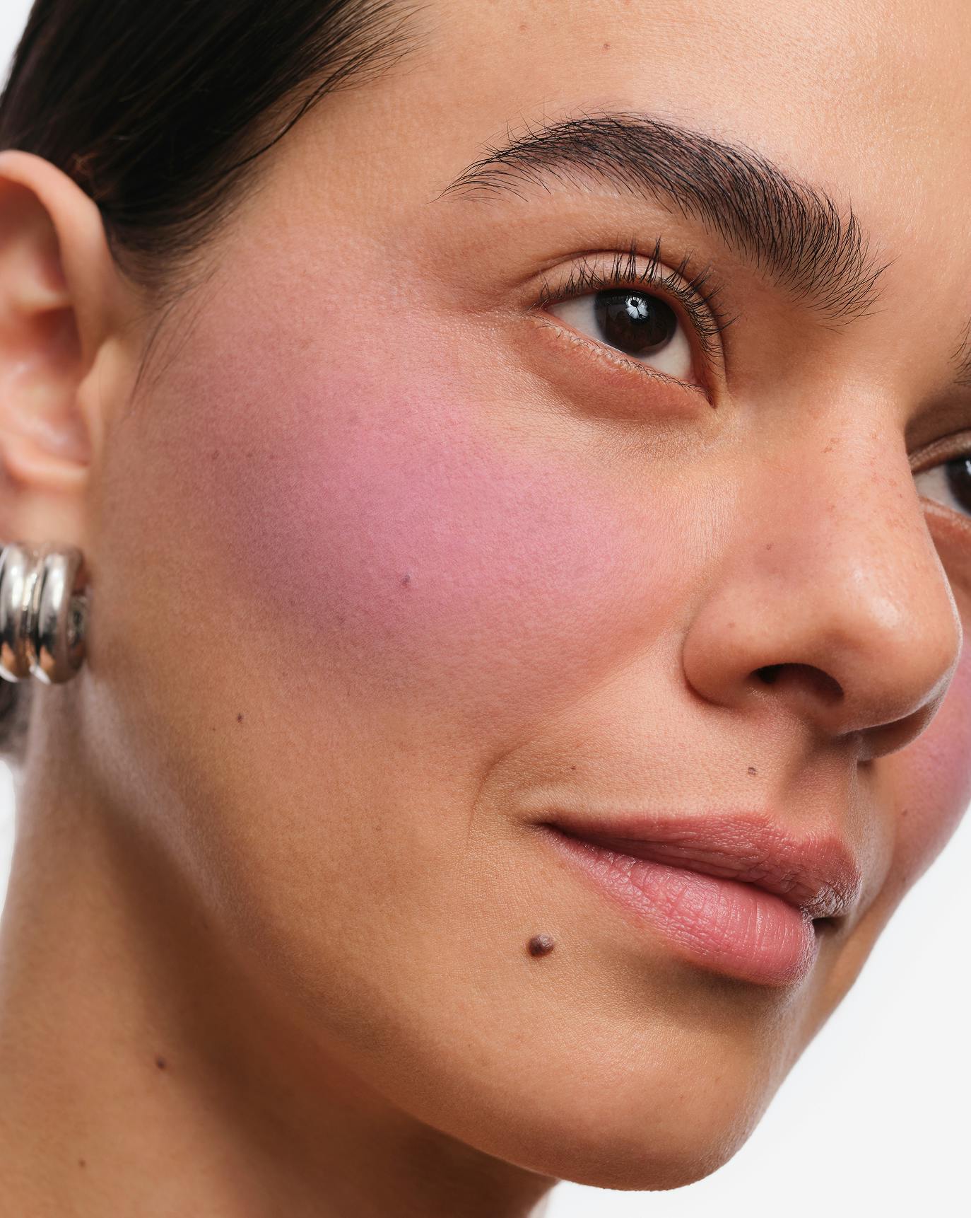 Joanna wears Cloud Paint Plush Blush in Billow.