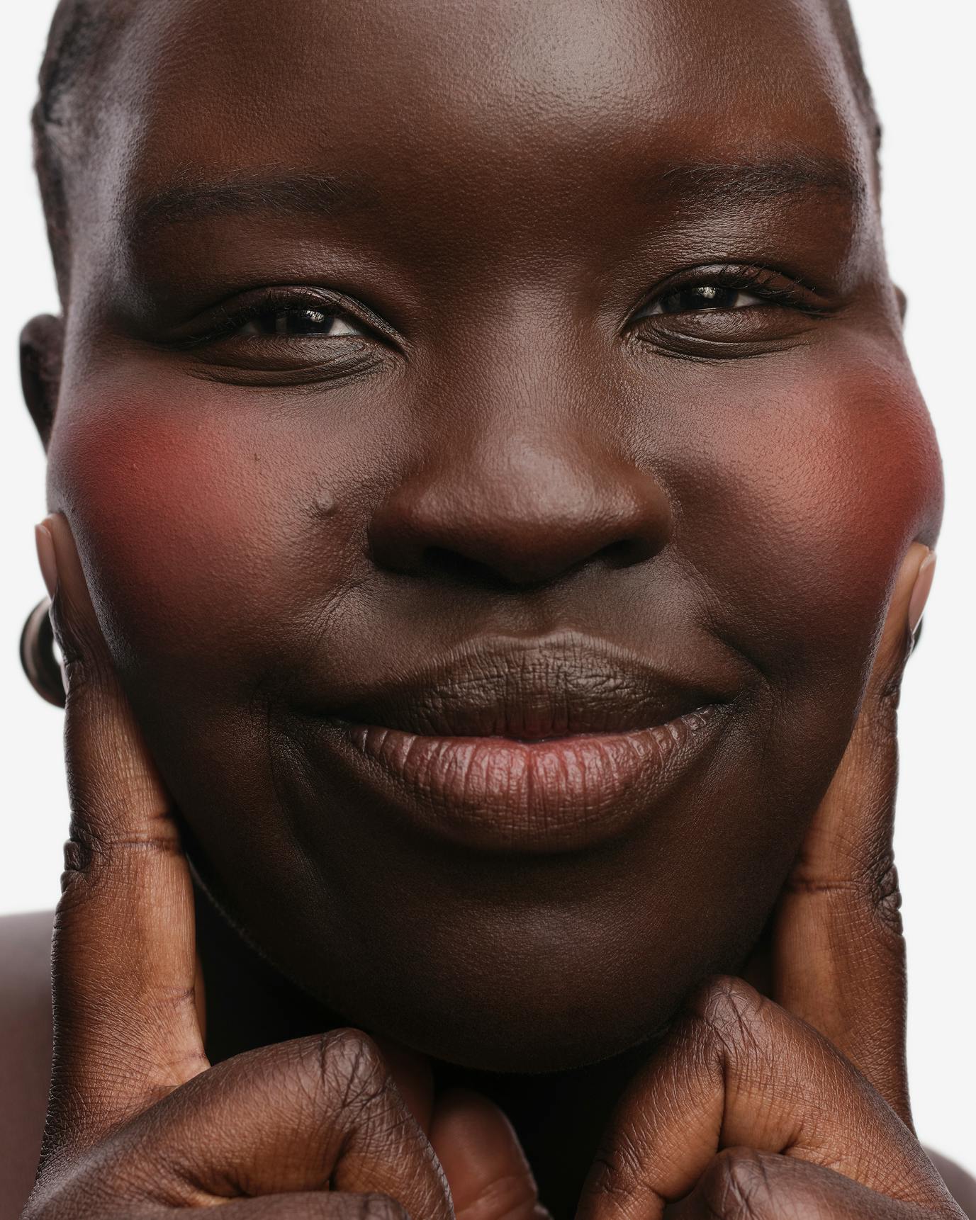 Anai wears Cloud Paint Plush Blush in Burst.