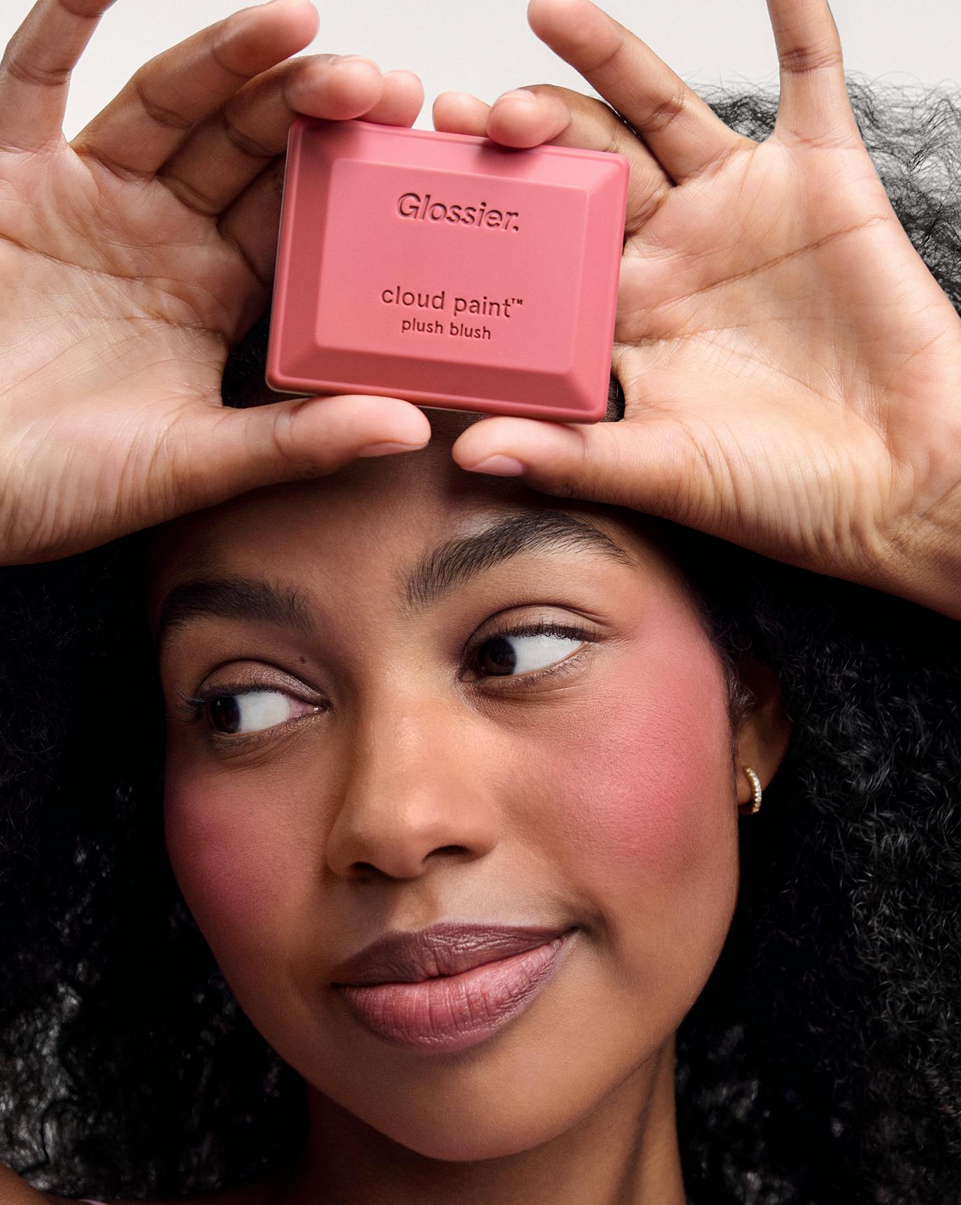 Yacine wears Cloud Paint Plush Blush in Float.