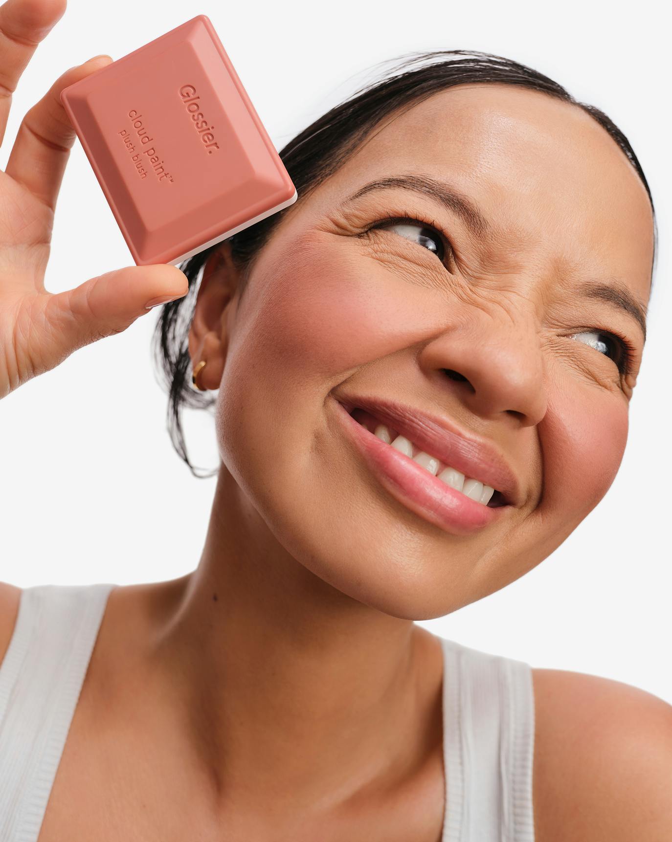 Christine wears Cloud Paint Plush Blush in Gale.