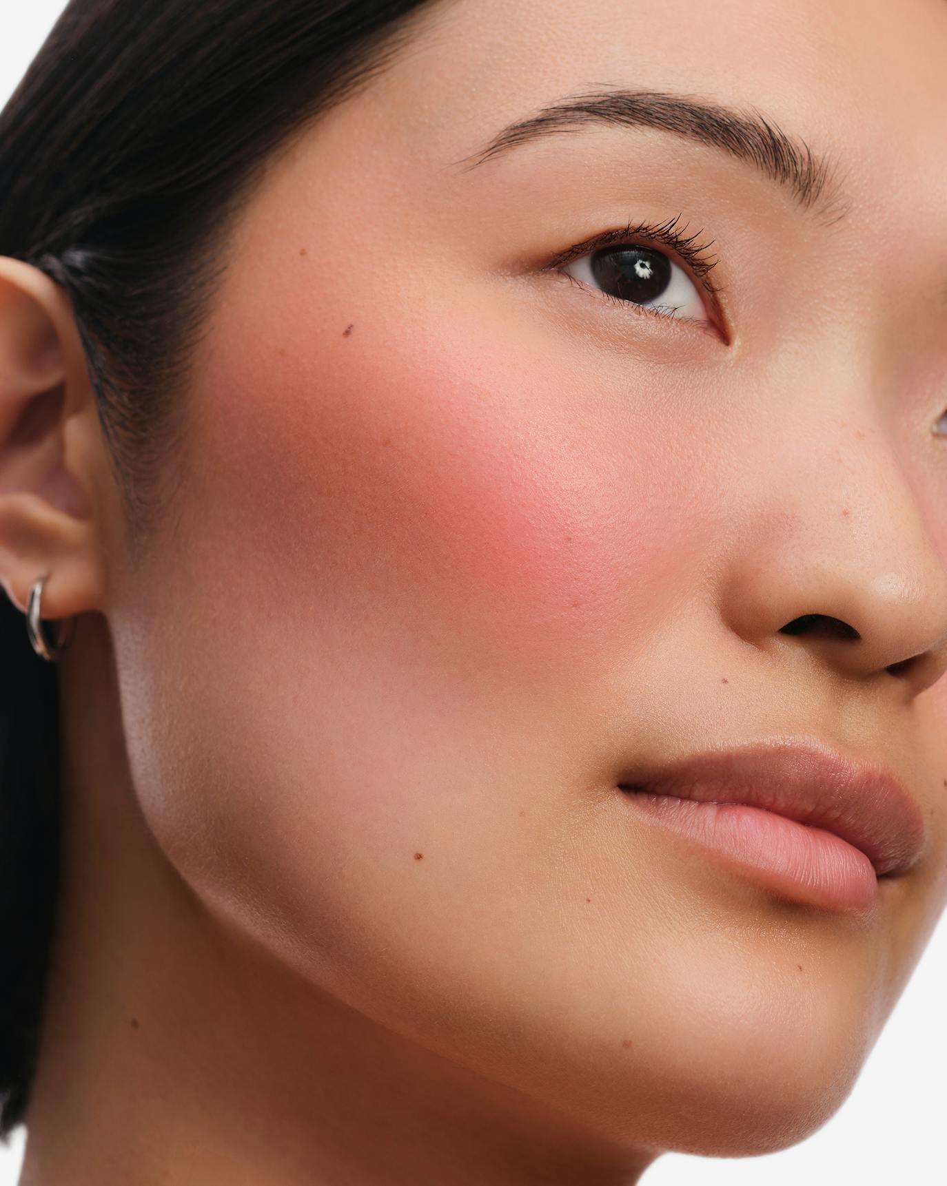 Chris wears Cloud Paint Plush Blush in Soar.