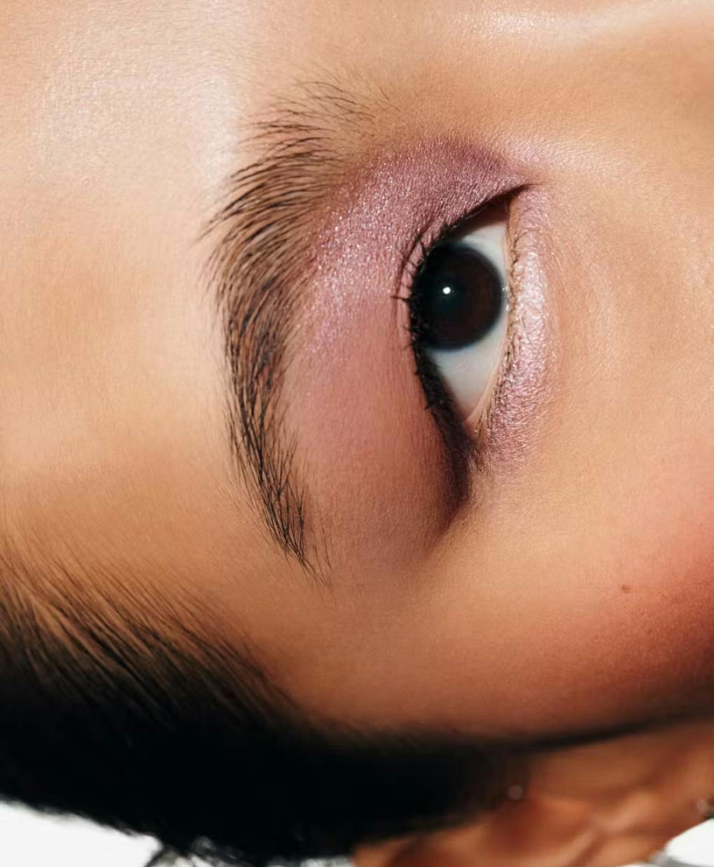 model wears monochromes in clay