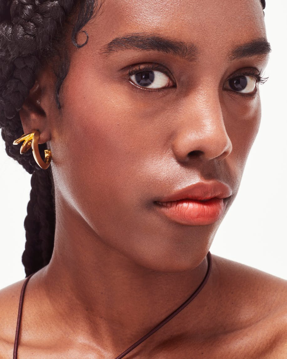 model looking off to side wearing generation g in zip