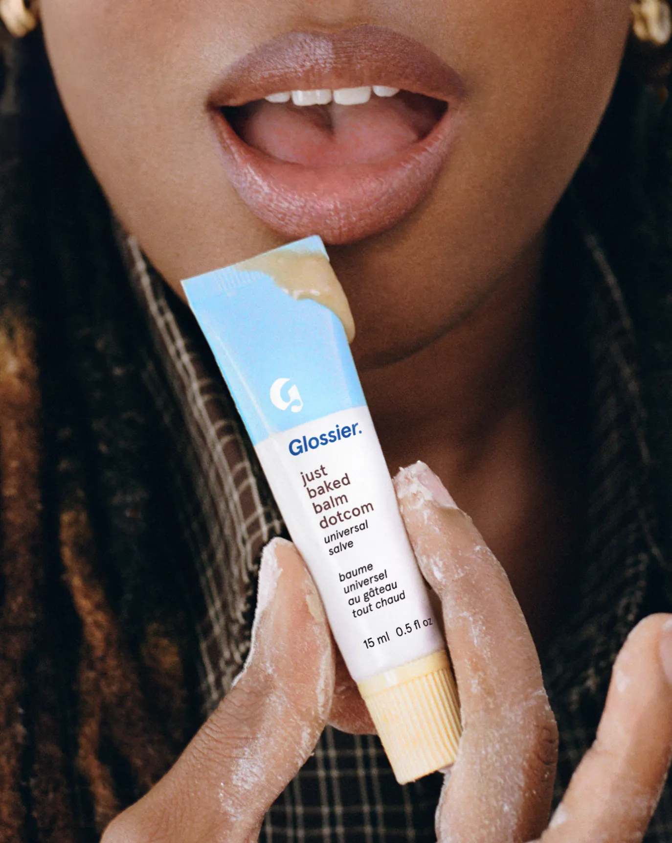 Camari wears Just Baked Balm Dotcom.