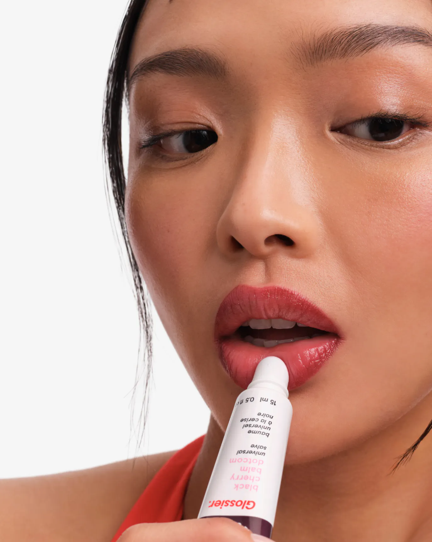 Joy wears The Black Cherry Lip Line + Balm Duo.