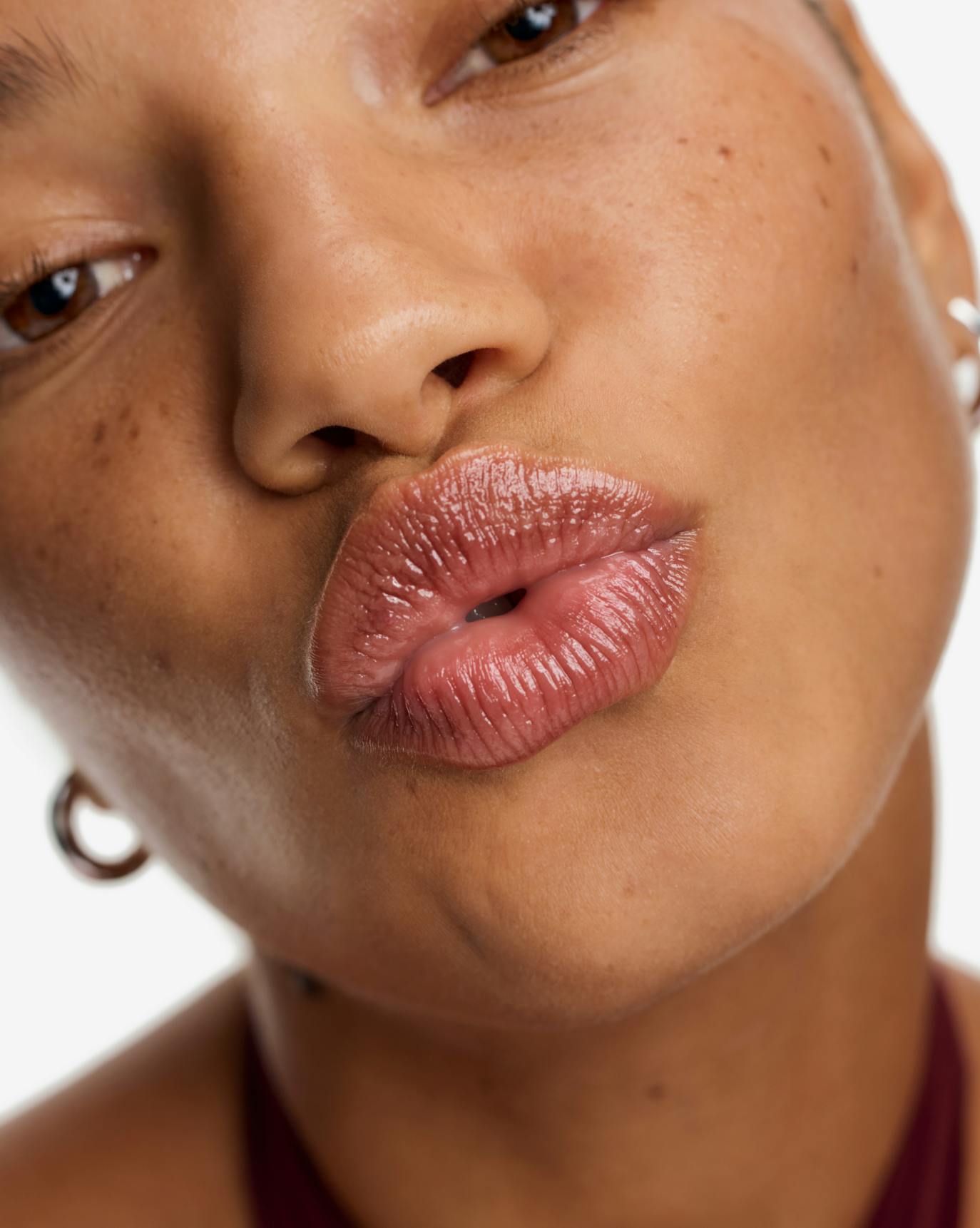 Kai wears Hot Cocoa Balm Dotcom.