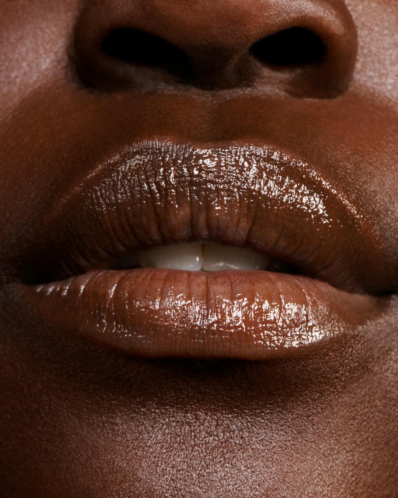 Yacine wears Espresso Balm Dotcom.