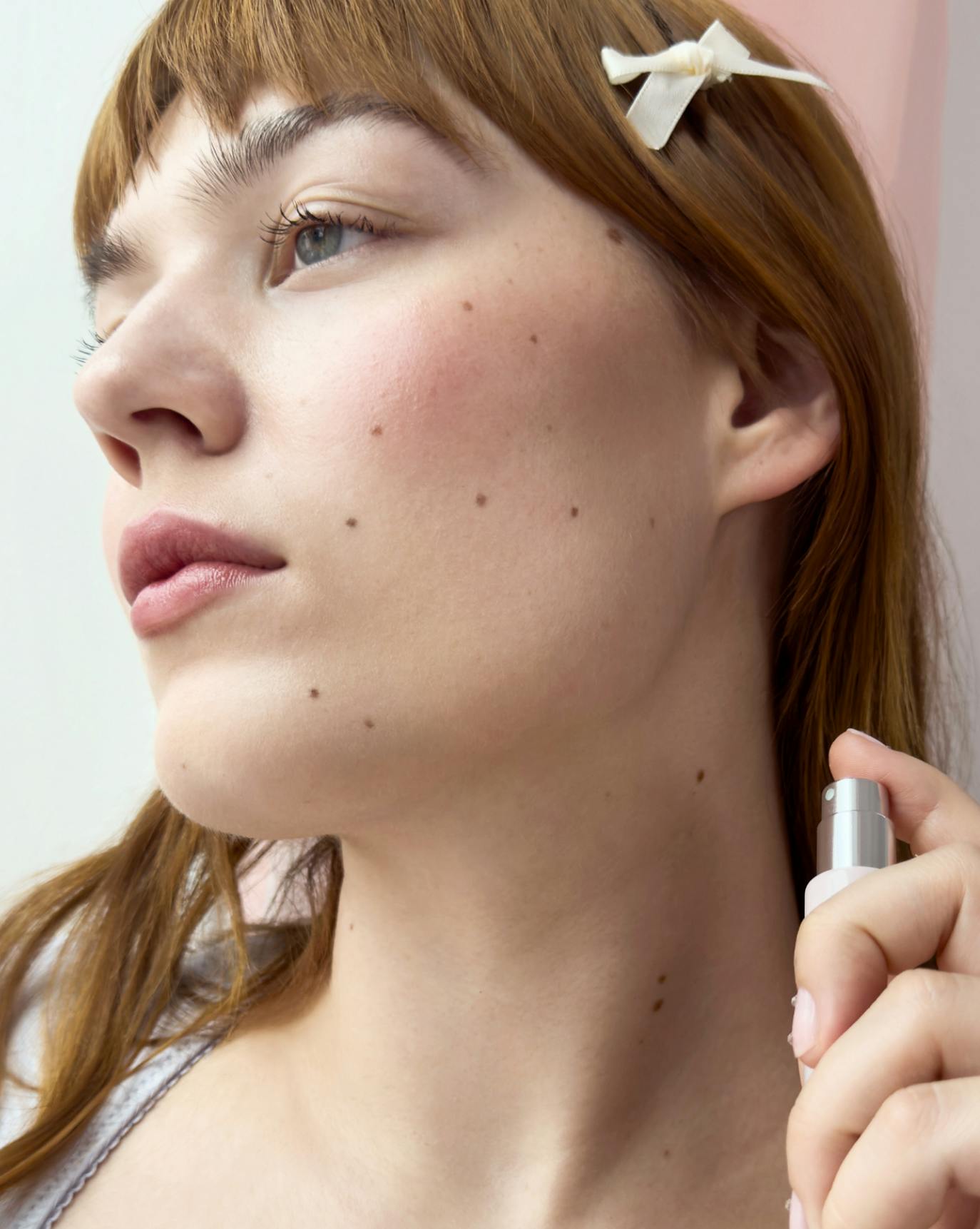 Lulu wears Glossier You.