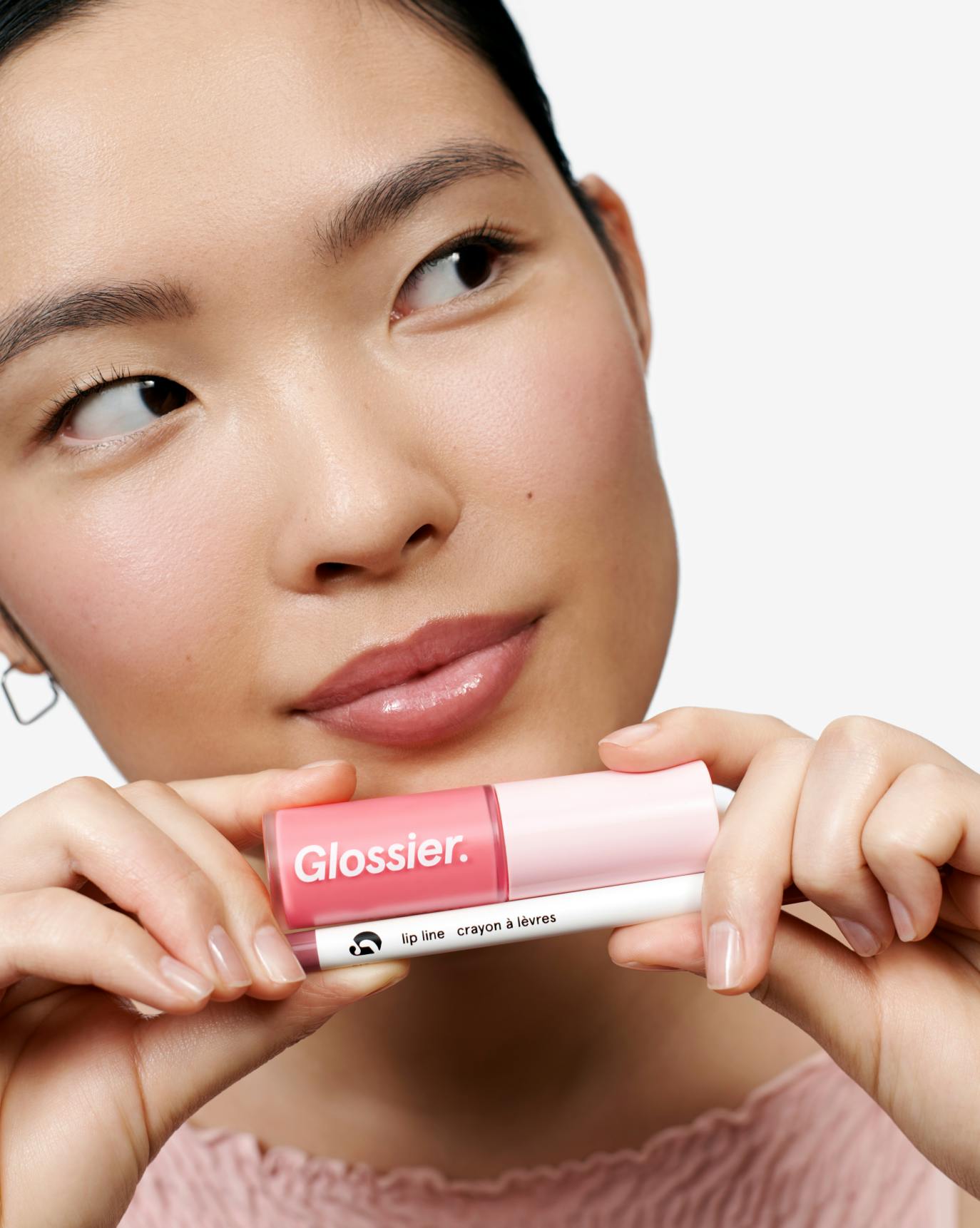 Alison wears Lip Glaze in Chilly + Lip Line in Grip.