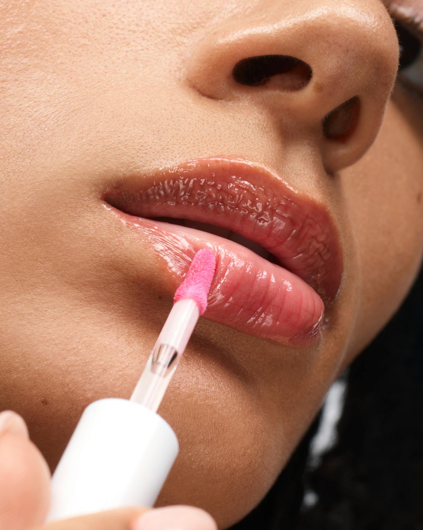 Memphy wears Lip Gloss in Red.