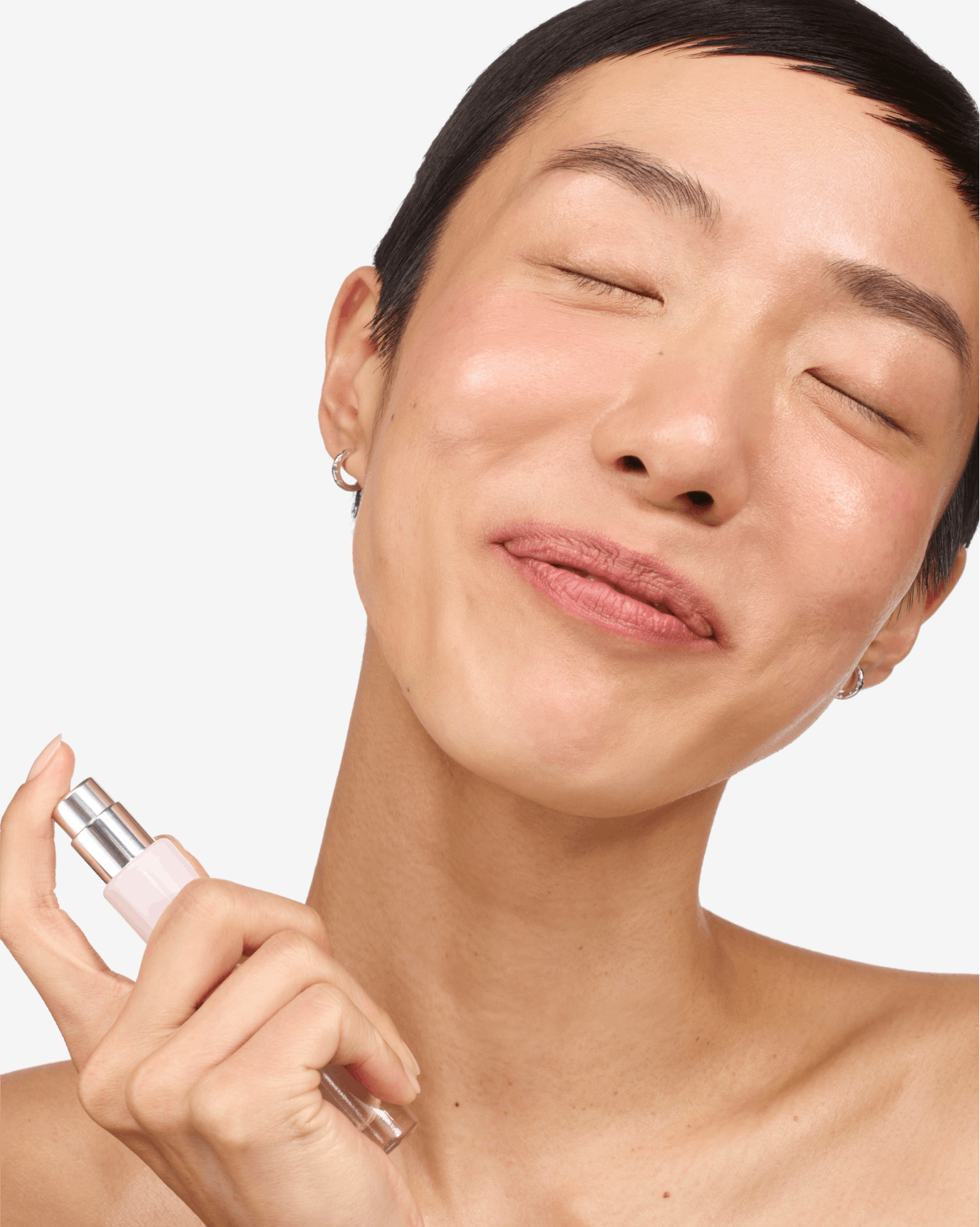 Ayelen wears Glossier You Travel Spray.