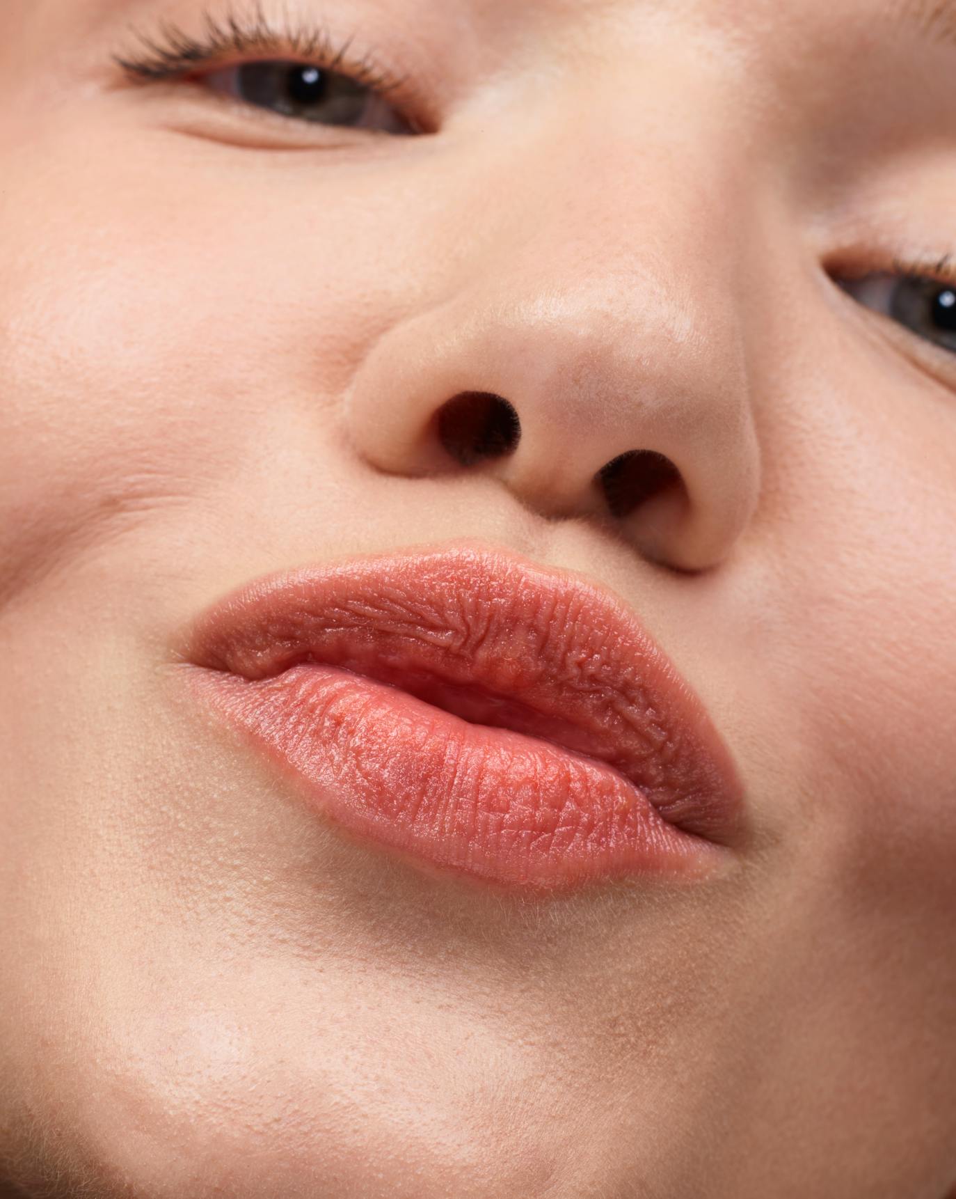 Juliette wears Wild Fig Balm Dotcom.