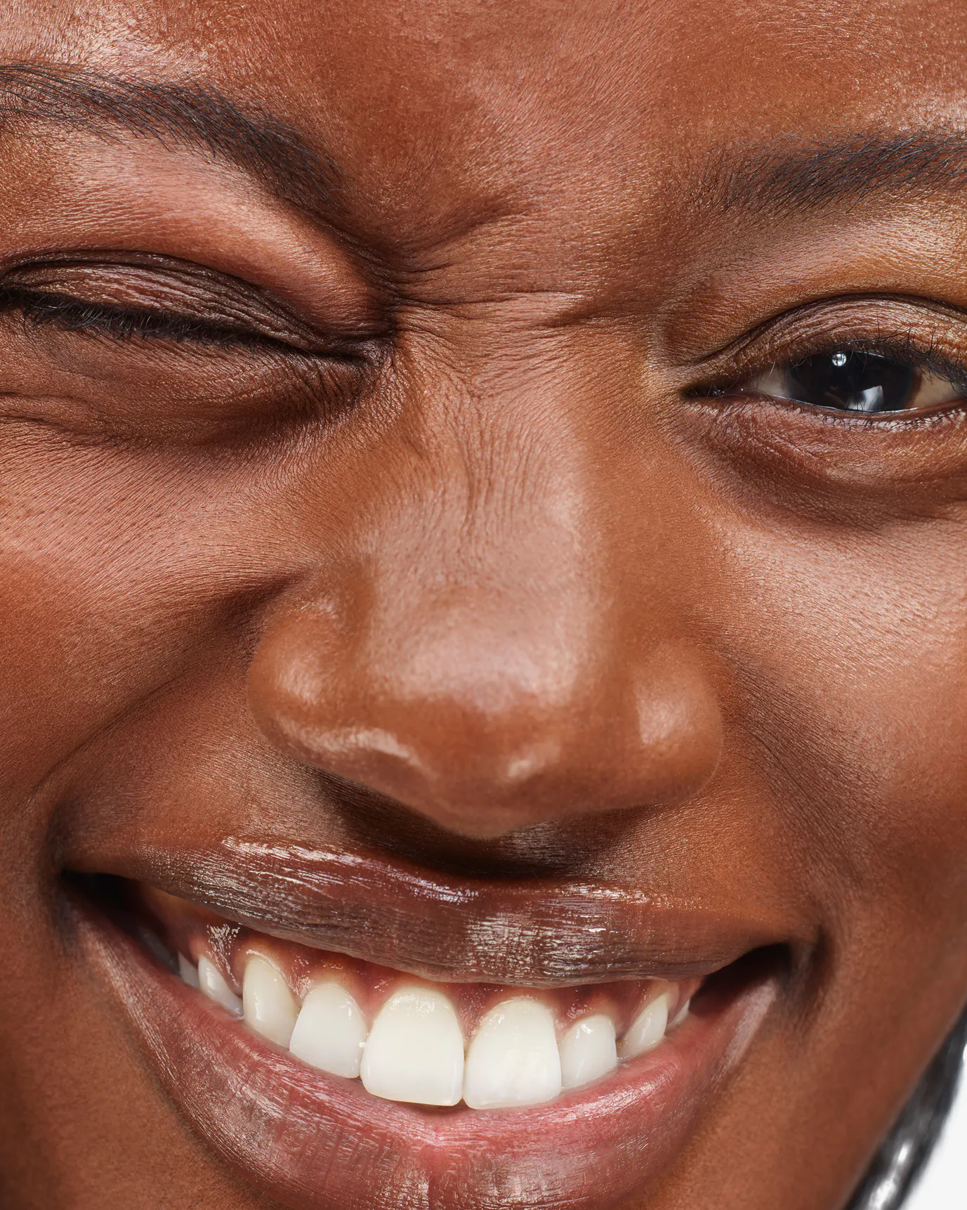 Brenda wears Stretch Balm Concealer in D5.