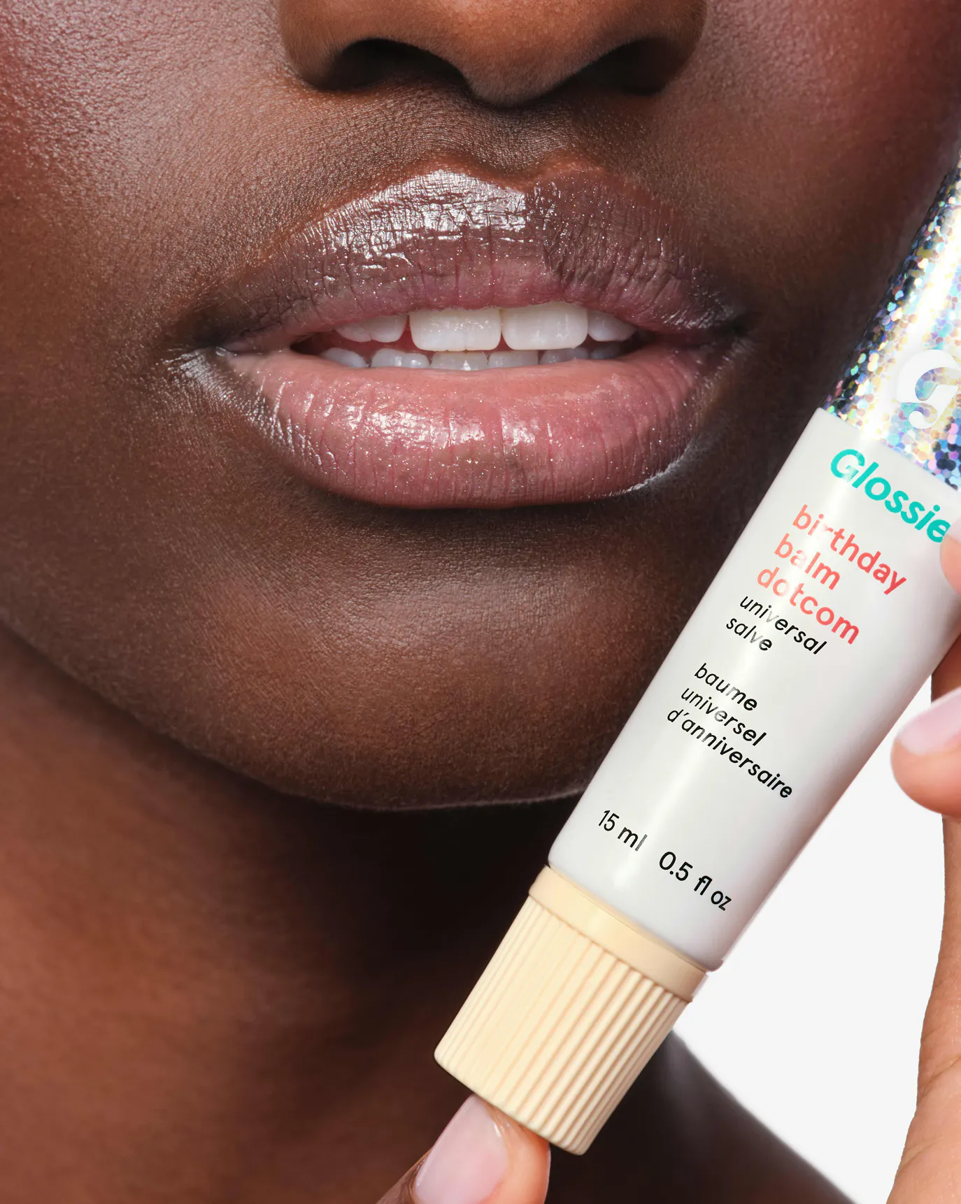 Mariama wears Birthday Balm Dotcom.