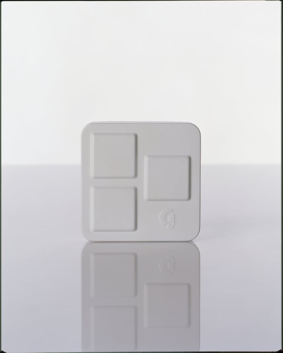 product packaging of monochromes against white background